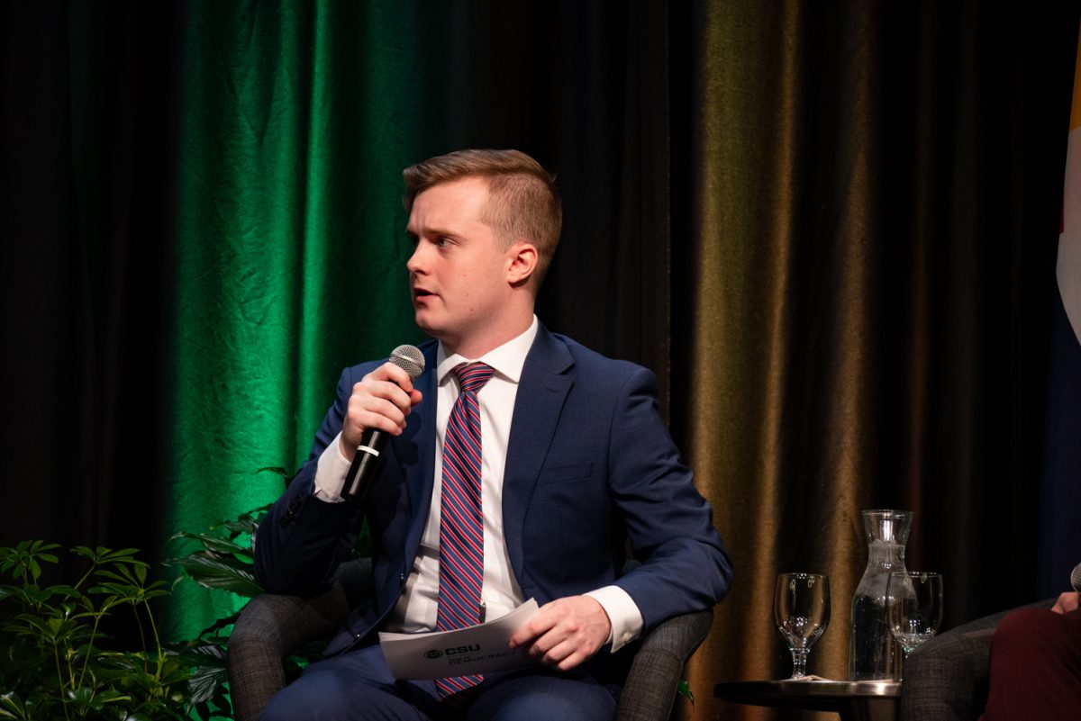 Student moderator Jack Barrett asks another question at the Coffee with Ken Buck event in the University Ballroom.