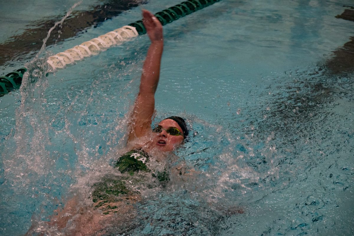 Senior Rachel Saxon competes in the 200-yard backstroke in Colorado State University's Moby Pool against the University of Northern Colorado.