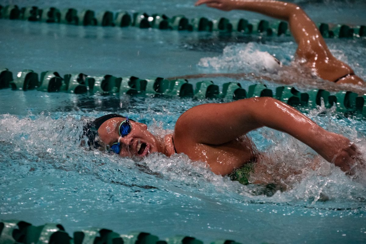Junior Emily Chorpening competes in the 1,000-yard freestyle event at Colorado State University's Moby Pool against the University of Northern Colorado.