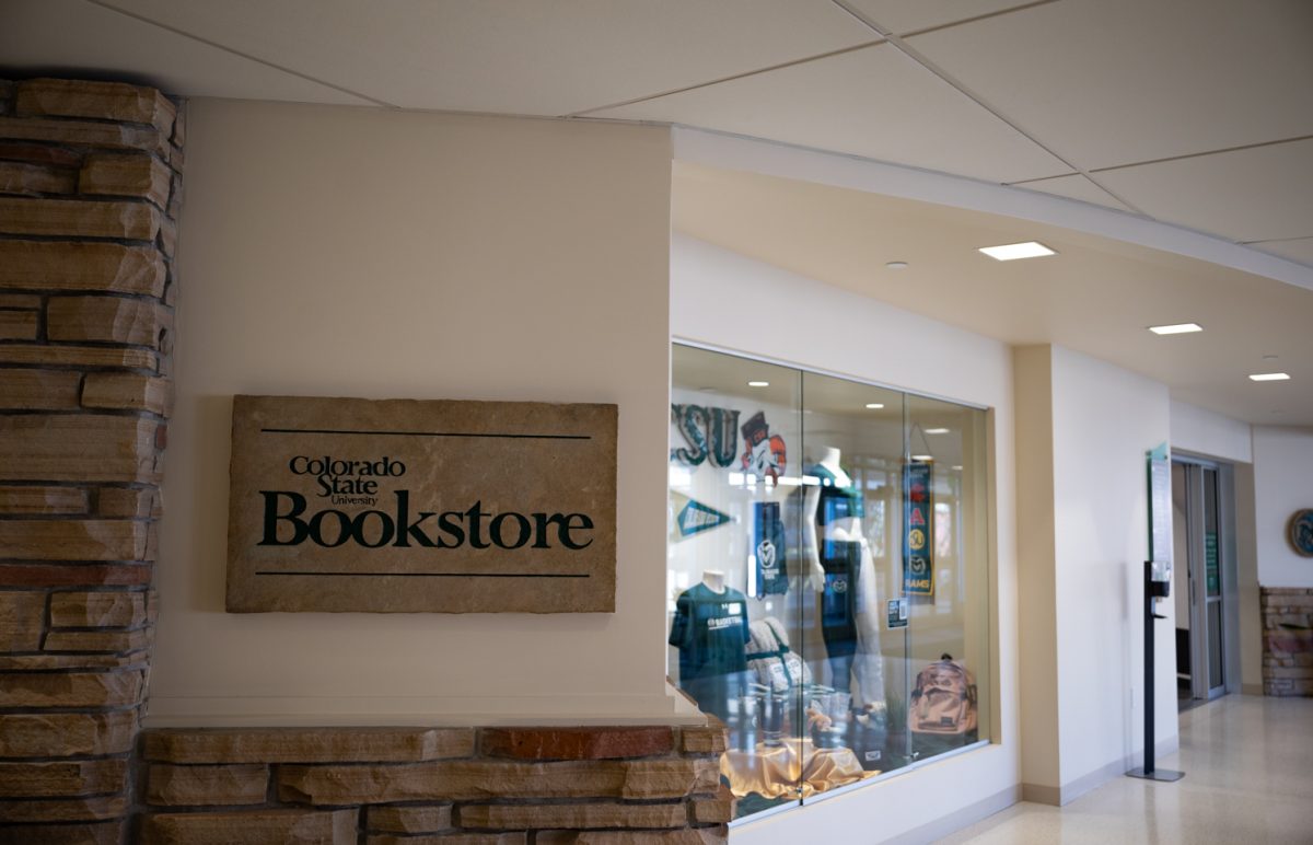 The sign and display case outside of the Colorado State University Bookstore.