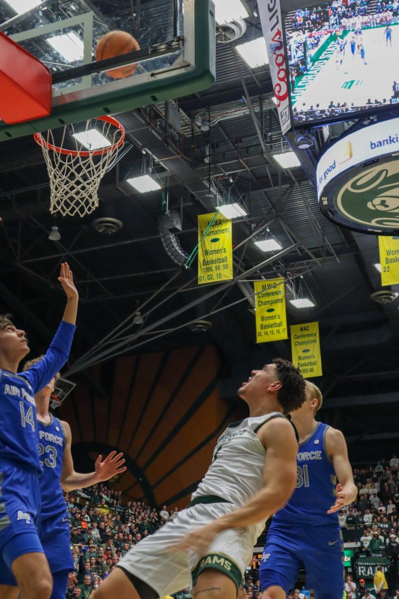 Joel Scott (1) shoots the ball, scoring for Colorado State University against the U.S. Air Force Academy Jan. 16. CSU won in overtime 78-69.