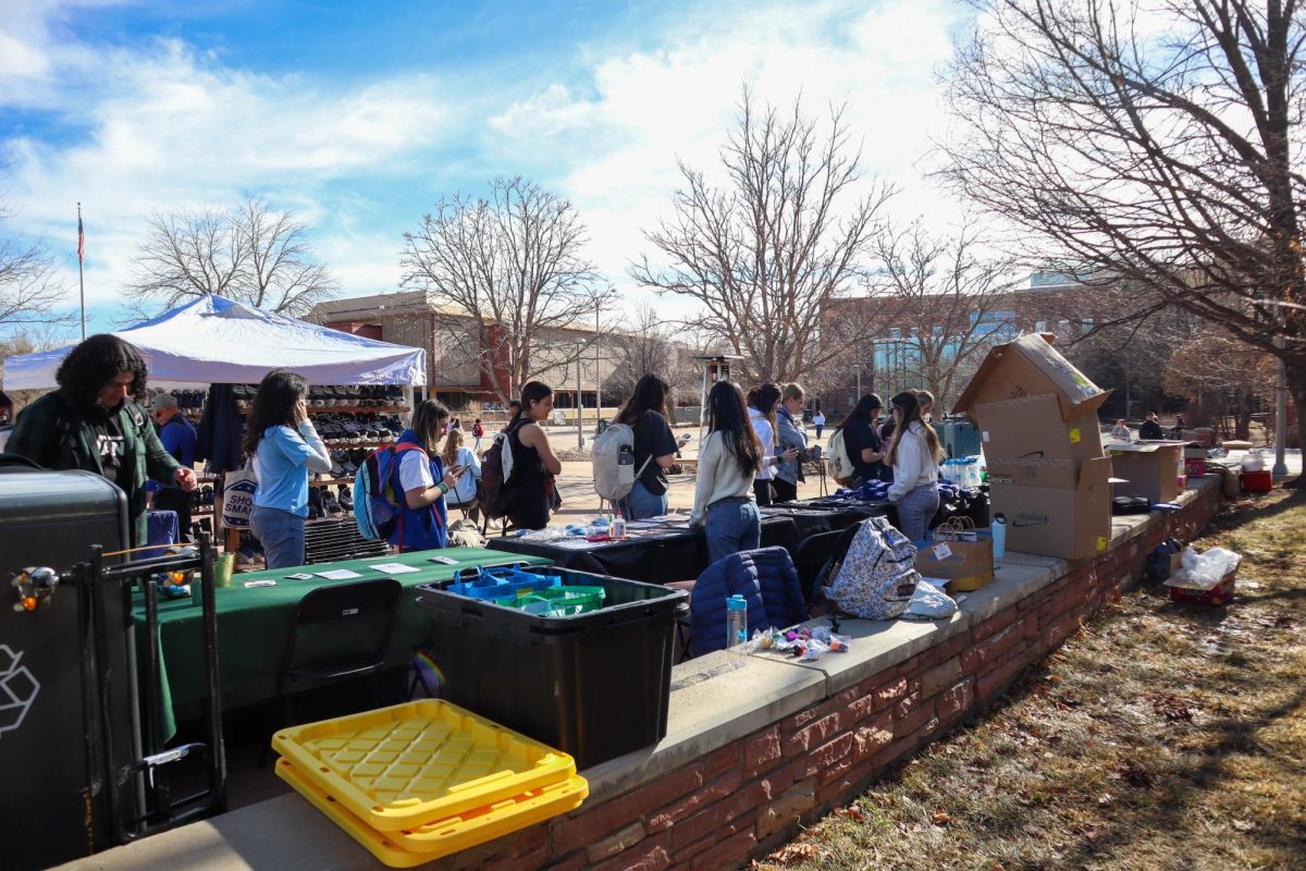 Students wait on line to pick over the merchandise, craft and snack tables at the Residence Hall Association's "Rams on Ice" Jan.31.