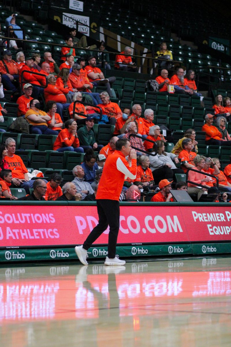 Colorado State Womens Basketball head coach Ryun Williams yells plays to his team.