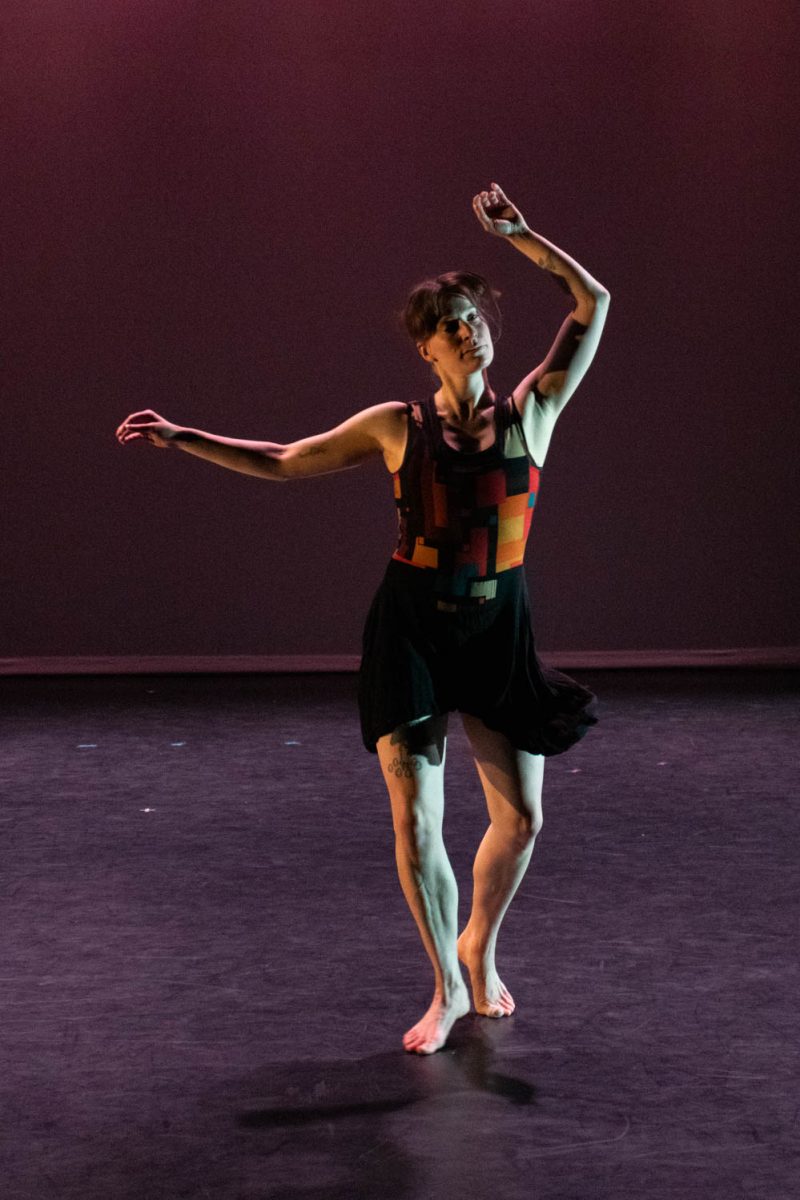 A member of the Hannah Kahn Dance Company performs during the tech rehearsal for the Body/Speak recital on February 9, 2024.