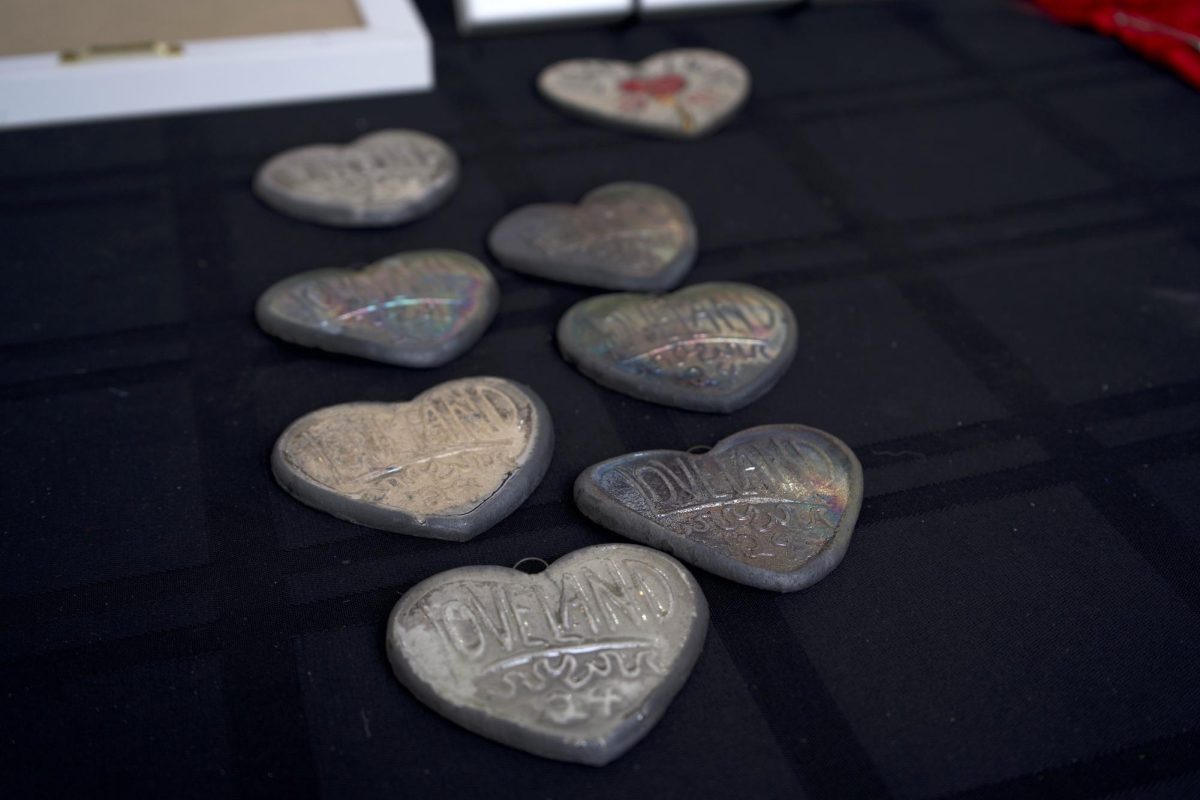 Ceramic hearts made by artist Amy Joy Hosterman are laid out on a table for attendees at Lovelands Annual Sweetheart Festival Feb. 10. 