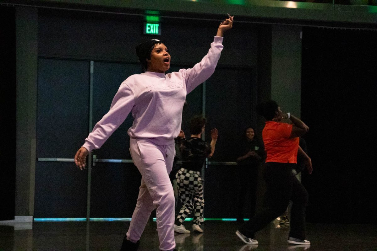 One of the instructors cat walking during the Category is Ballroom event on February 15, 2024.