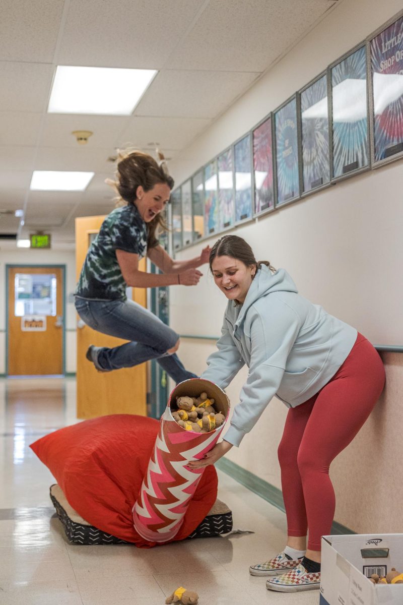 Little Shop of Physics Teacher in Residence Cherie Bornhorst and student intern Grace Balle demonstrate their system for distributing stuffed toys during outreach events Feb. 15.