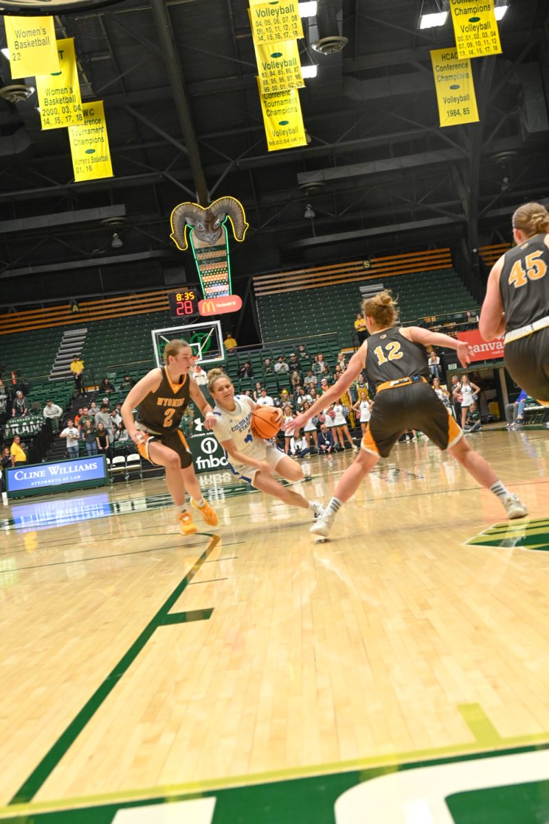 McKenna Hofschild fights through Wyoming defense to score during the CSU vs. Wyoming women's basketball game on Feb. 17, 2024. (CSU won 75-70)