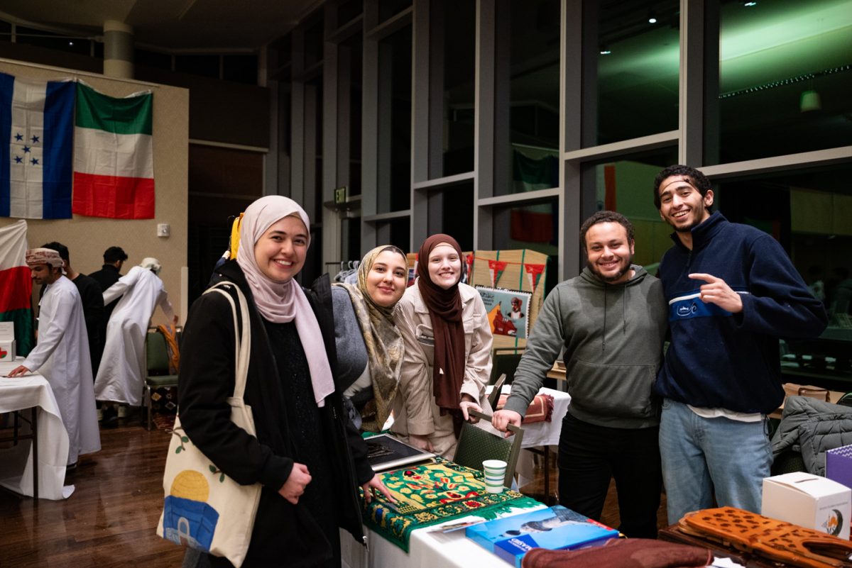 Members of the Muslim Students Association pose for a photo at the World Unity Fair Feb. 17.