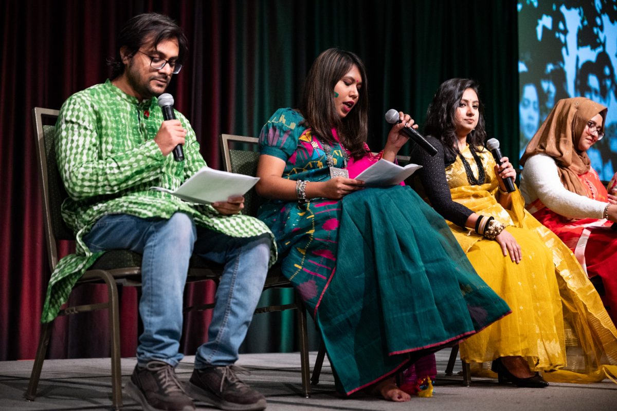 Members of the Bangladesh Student Association present information about their culture and language at the World Unity Fair Feb. 17.