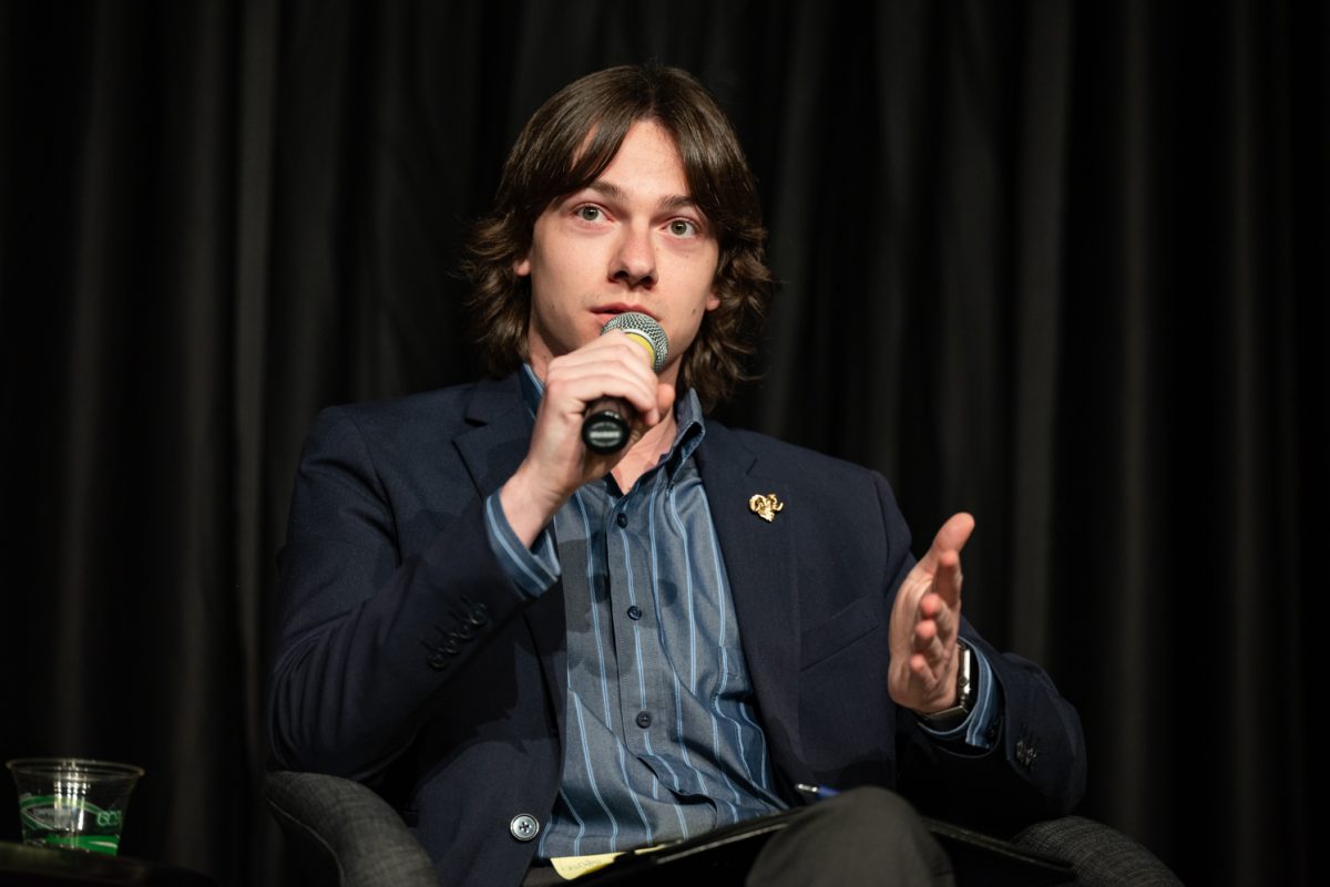 Panelist Nick DeSalvo, ASCSU president, shares his thoughts on cognitive testing for politicians at a Thematic Year of Democracy discussion.
