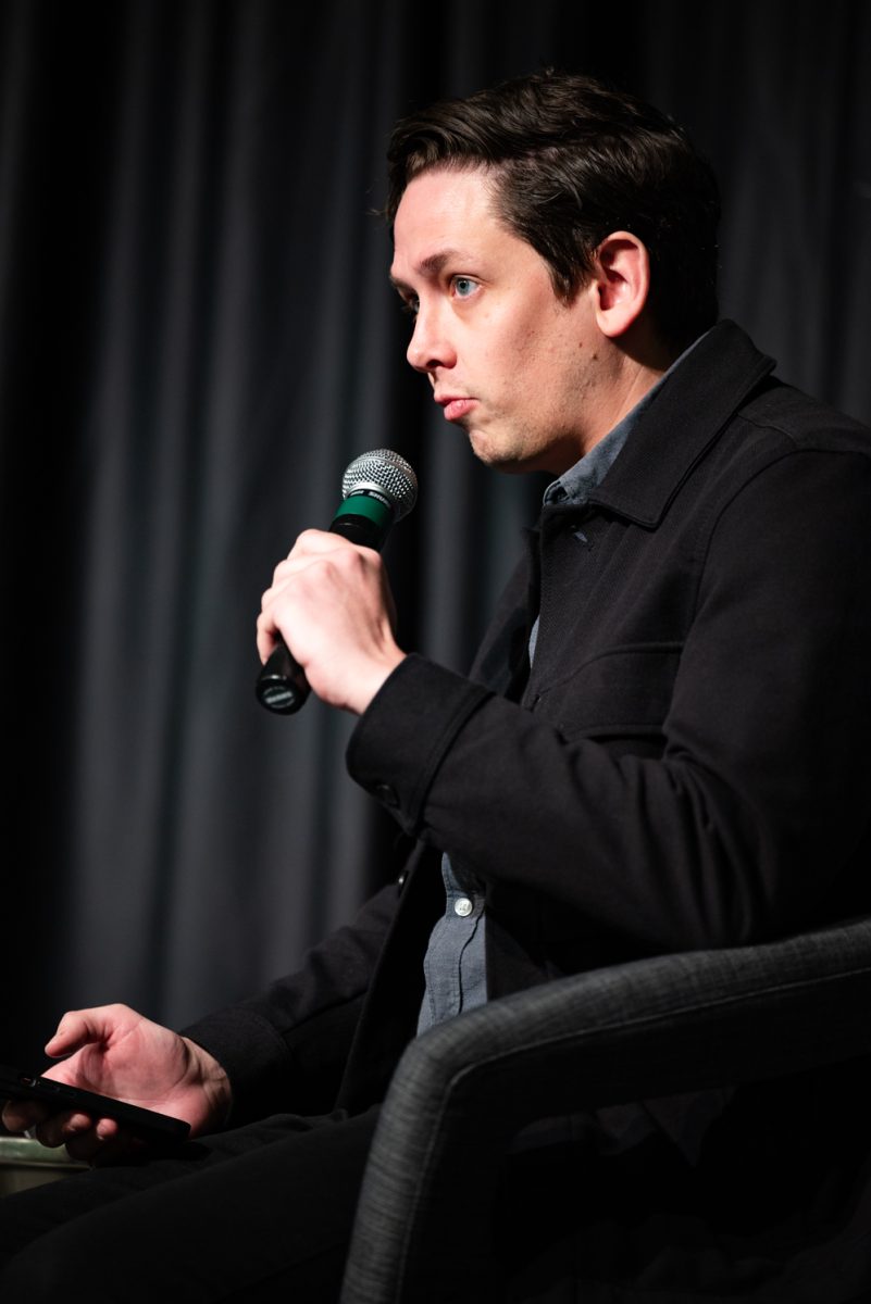 Panelist Lucas Brady Woods, a State Capitol Reporter at KUNC, shares his opinion on age limits in politics at a Thematic Year of Democracy discussion.