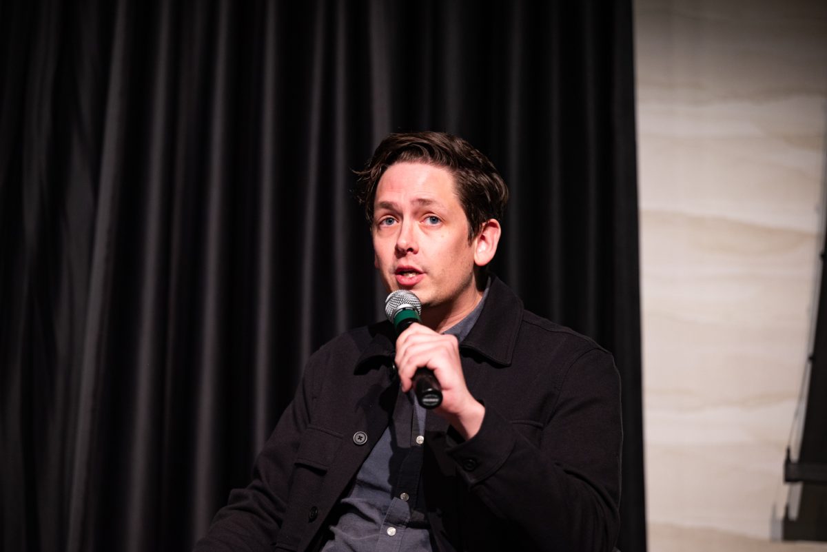 Panelist Lucas Brady Woods, a State Capitol Reporter at KUNC, shares his opinion on age limits in politics at a Thematic Year of Democracy discussion.