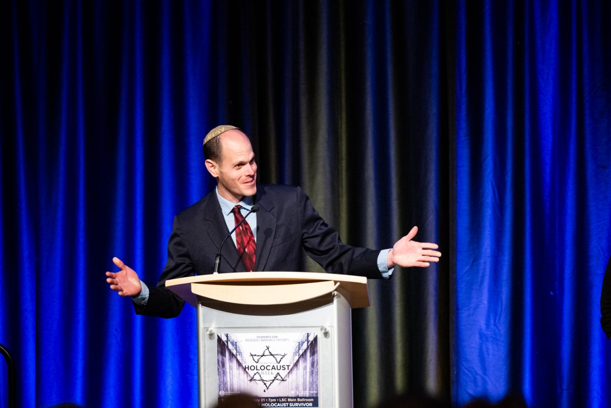Adam Fox, CSU Hillel Director of Jewish Student Life, shares a personal story at the Evening with a Holocaust Survivor event.