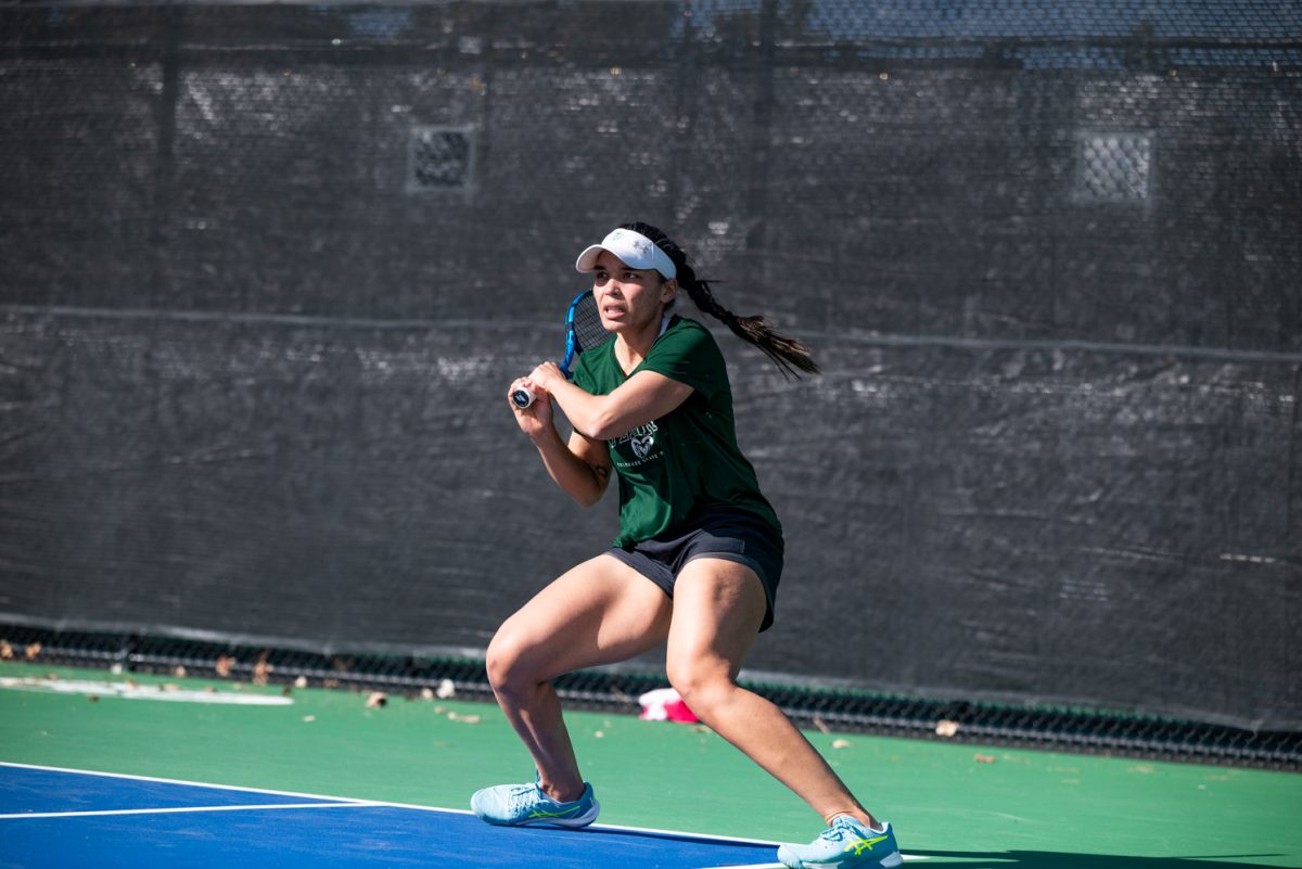 Graduate student Zara Lennon competes in a singles match against Northern Arizona University.
