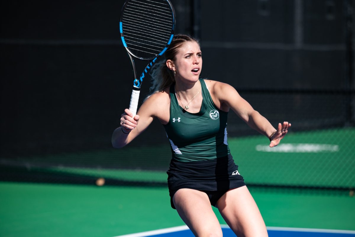 Graduate student Sarka Richterova runs to strike the ball during a singles match against Northern Arizona University.