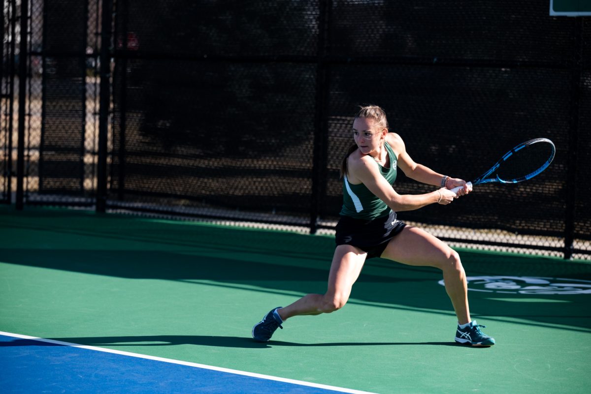 Graduate student Radka Buzkova prepares return the ball during a singles match against Northern Arizona University.