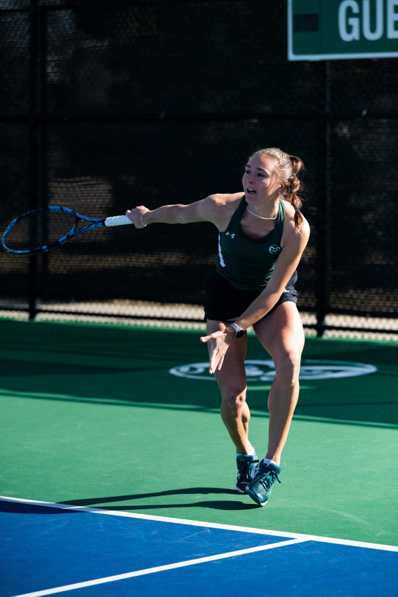Graduate student Radka Buzkova hits the ball during a singles match against Northern Arizona University.