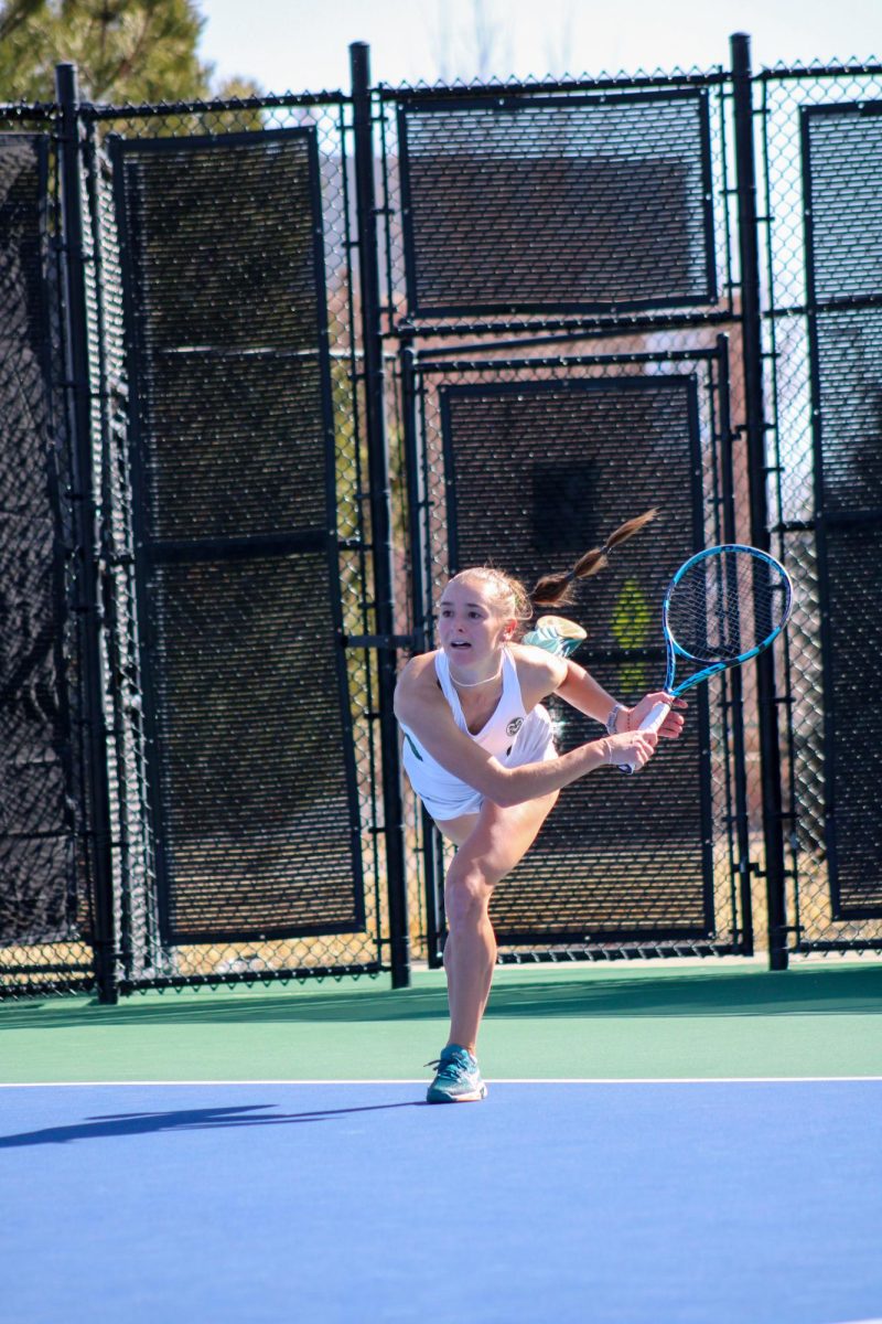 Radka Buzkova, a member of Colorado States Womens Tennis Team, lunges forward after hitting the ball Feb. 25.