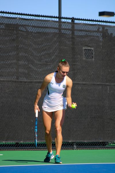 Colorado State Womens Tennis player Radka Buskova bounces the ball in preparation of serving Feb. 25.