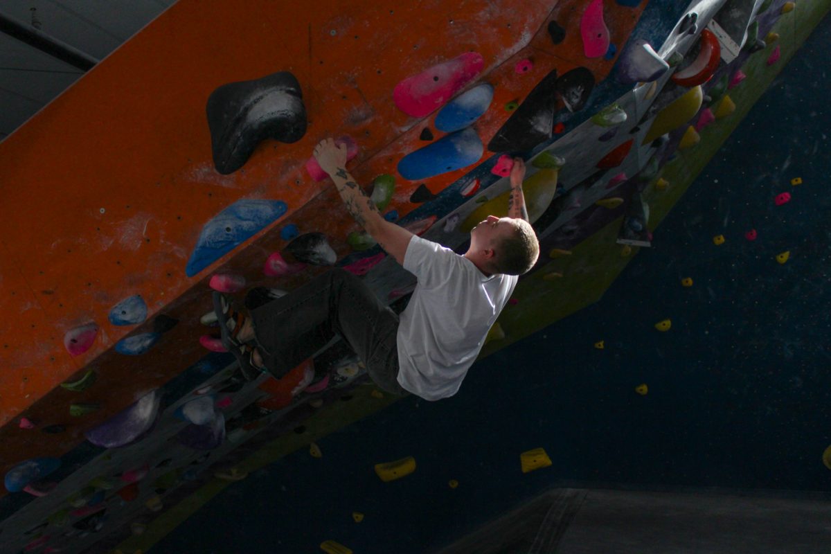 Mitch Perez climbs the overhang at Ascent Studio Climbing and Fitness Feb. 26.