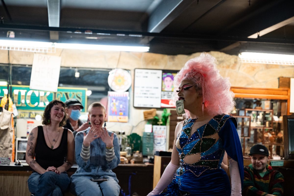 Vegina Quartz holds a dollar from the audience in her mouth during her performance at the Funktastic Drag Show.