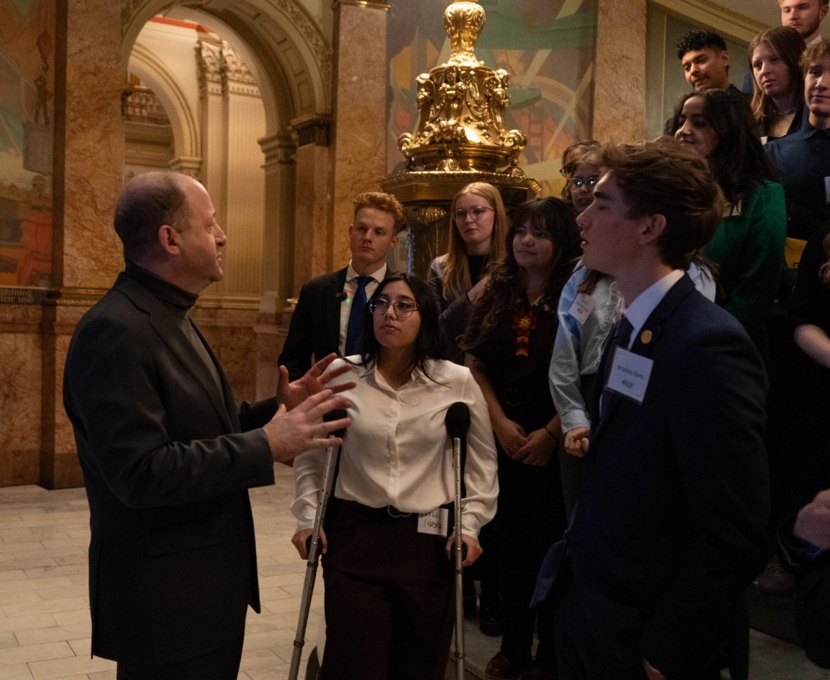 Gov. Jared Polis speaks to members of the Associated Students of Colorado State University attending a Day at the Capitol event Feb. 8. Polis spoke about the importance of advocating for issues like HB24-1018, a bill that would eliminate taxes on college textbooks. 