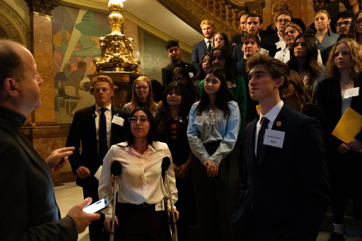 Governor Jared Polis speaks to members of the Associated Students of Colorado State University attending a Day at the Capitol event on Feb. 8. Polis spoke about the importance of advocating for issues like HB-1018, a bill that would eliminate taxes from college textbooks. 