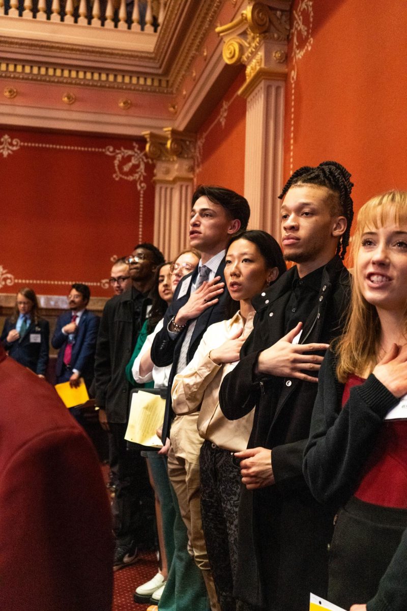 Student participants from the Associated Students of Colorado State University, including Sofia Hiller, Jakye Nunley, Tangia Zheng and Joseph Godshall, say the Pledge of Allegiance at the beginning of the Colorado State Senate session Feb. 8. The students attended a senate session to observe the legislative process. 