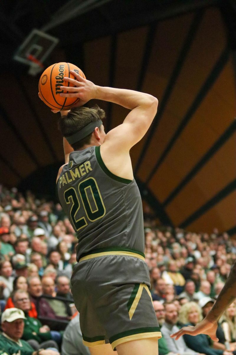 Colorado State University No. 20 Joe Palmer throws the ball overhead at the basketball game against San Jose State University. CSU won 66-47. Feb. 9.