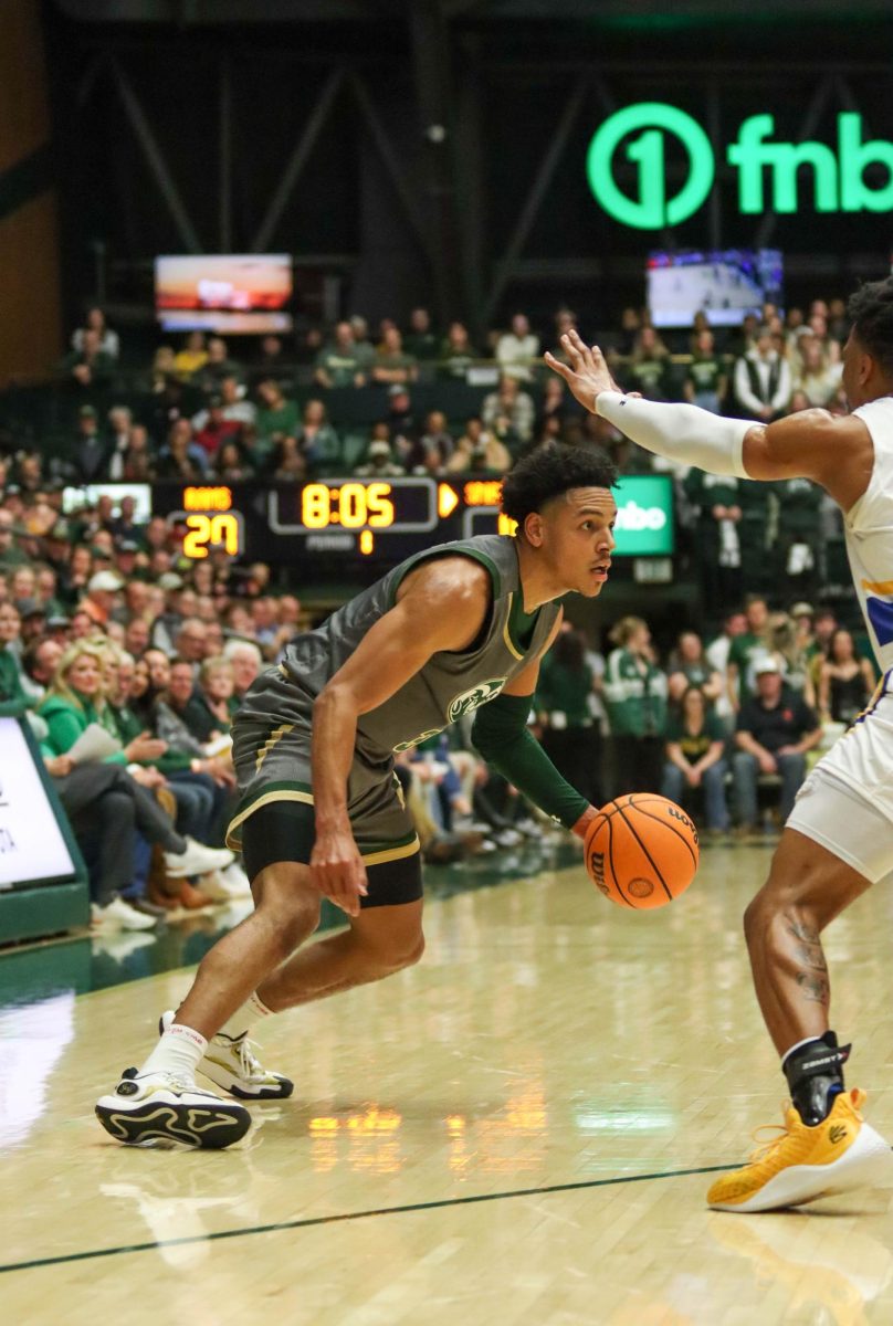Colorado State University No. 3 Josiah Strong dribbles the ball while looking for open teammates and maneuvering through San Jose State University's defense at the basketball game against San Jose State University. CSU won 66-47. Feb. 9. 