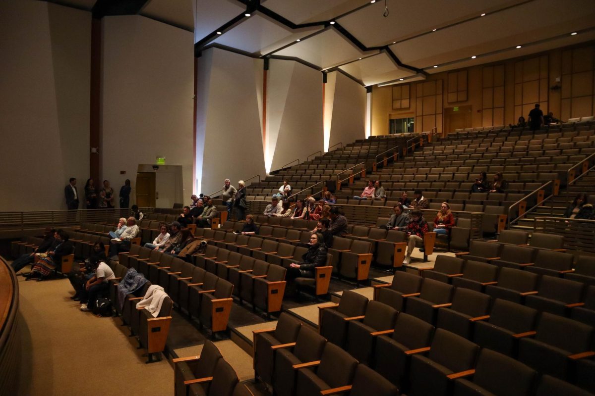 A crowd builds at the Pharaoh 171 and Red Berry Woman artist talk at Colorado State University's Center for the Arts. Their art exhibit is displayed in the Gregory Allicar Museum of Art, it will be open from February 16 to May 12, 2024.