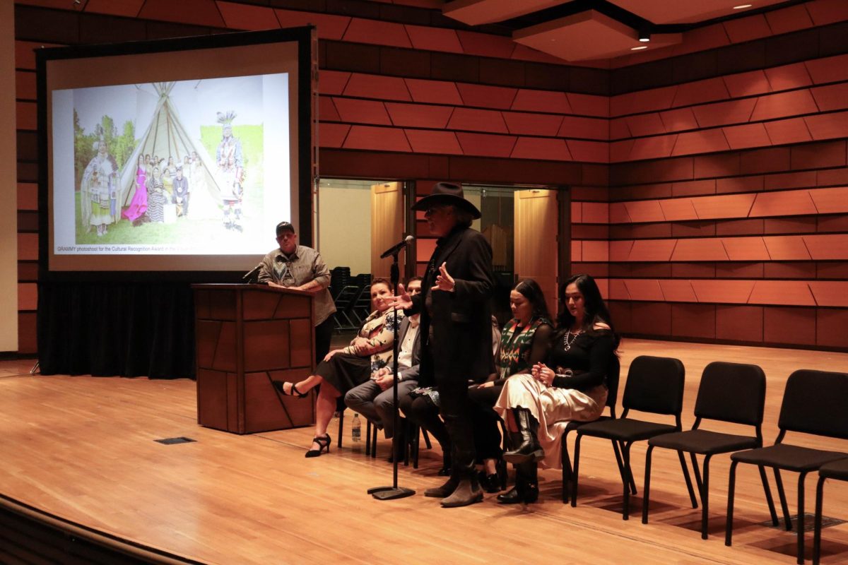 Joseph 'Sagonige Yanasi' Pekara (Pharaoh 171)'s good friend tells the crowd about Joe's work and his role in his journey to success. Joe's artist talk took place at Colorado State University's Center for the Arts. Feb 15.