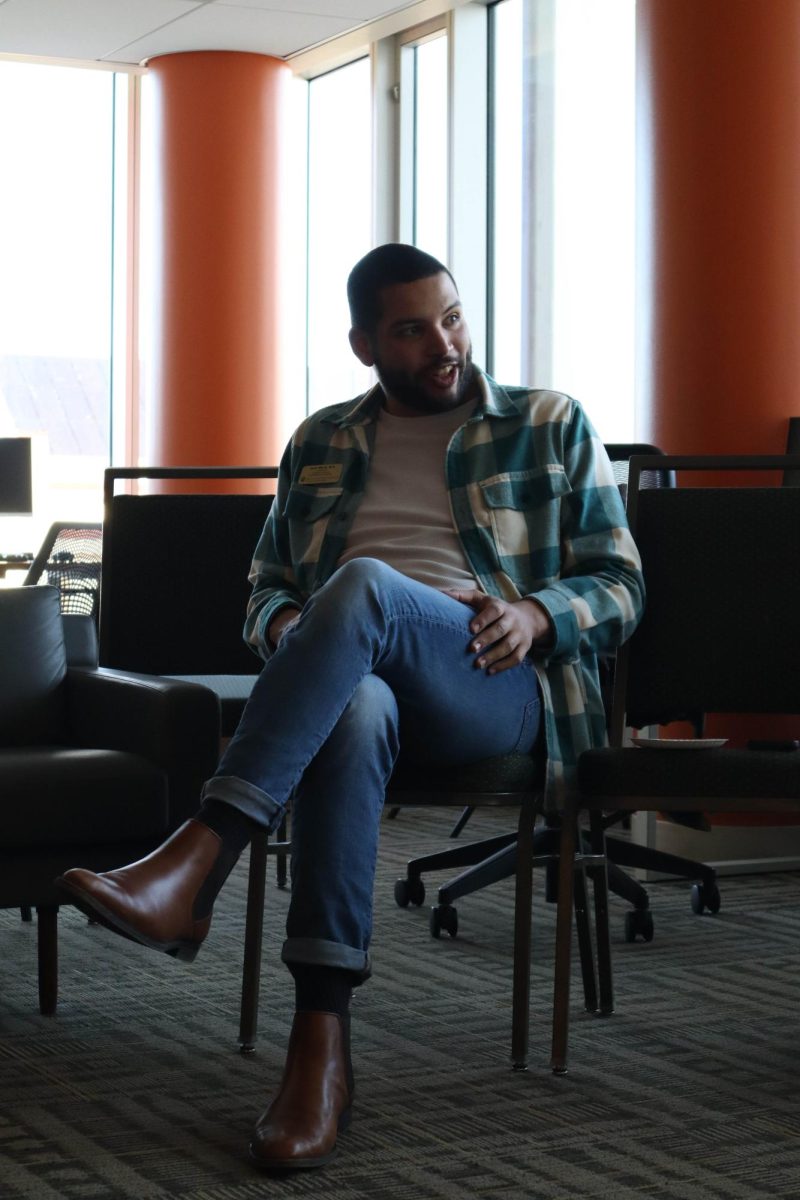 Assistant Director of the Pride Resource Center Josh Mack answers questions about race and gender at the Black/African American Cultural Center's Real Talk discussion Feb. 20.