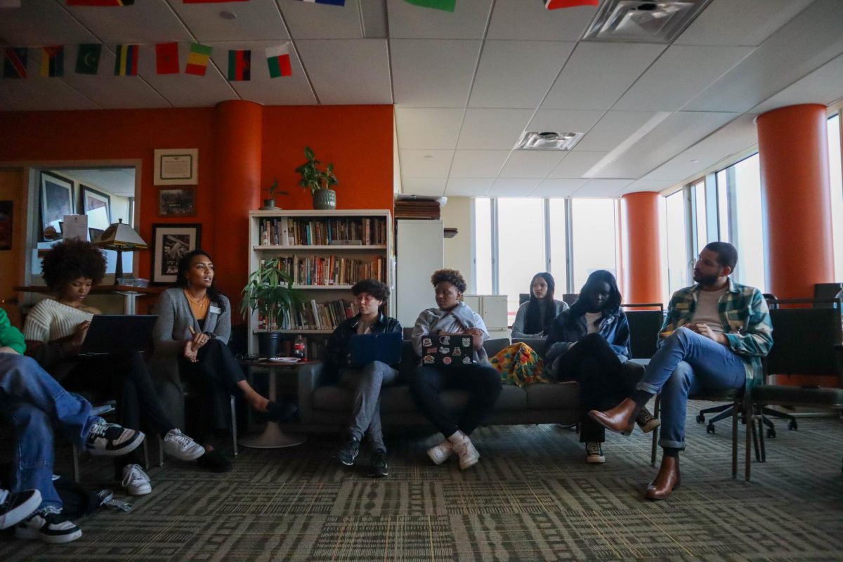 Colorado State University's student development and retention coordinator for the Black/African American Cultural Center (B/AACC), Nina Askew talks to students about about her experiences with race and gender while students and other Colorado State University diversity program staff members listen. Feb 20.