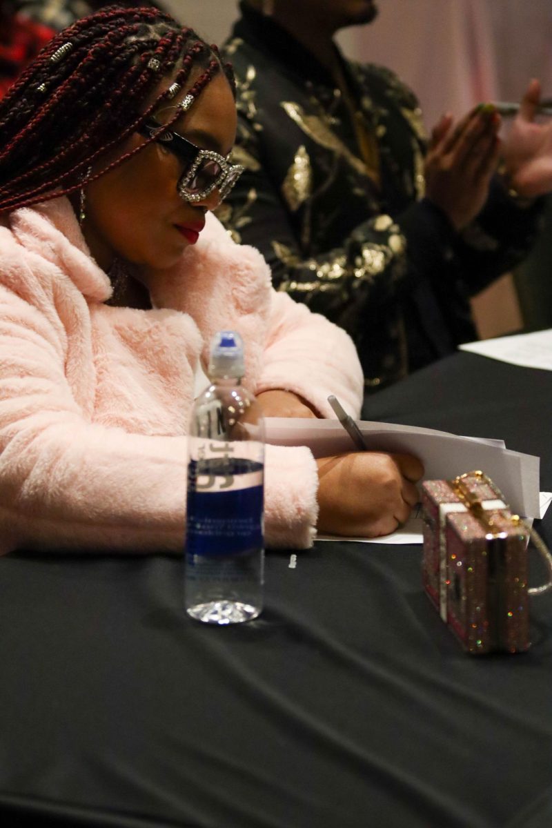 Colorado State University art student Nura Abdullaah models clothing designed by students at the Hair and Fashion Show put on by United Women of Color and United Men of Color. Feb 22