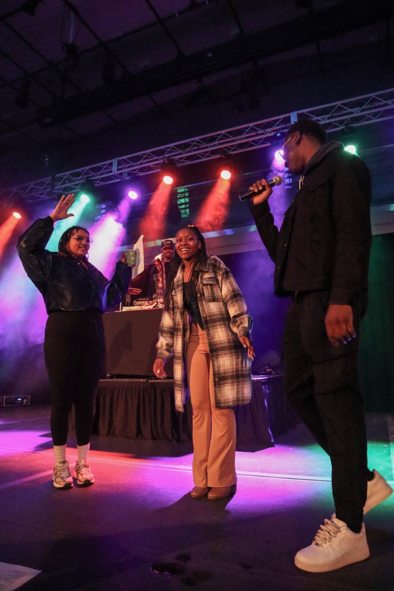 Colorado State University student emcees Adam Akakpo and Olive White Eagle-Dodson announce Emmajyn, the winner of the Black/African American Cultural Center's (B/AACC) Hair and Fashion Show. Feb 22.