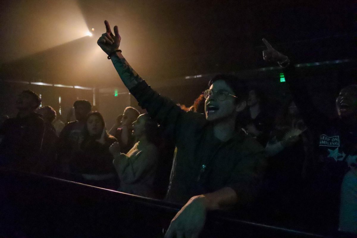 Students shout and cheer along to Coast Contra's performance in the Lory Student Center Theater. Feb 22.
