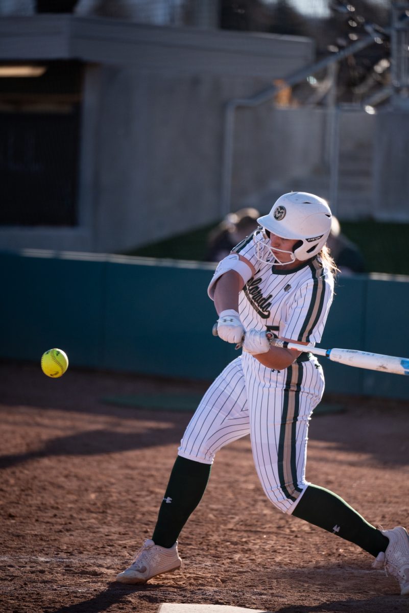 Senior Sydney Hornbuckle (5) swings for the ball against Iowa State.