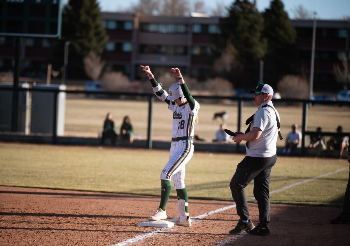 Senior Ashley York (18) celebrates at first base during CSU's second game of the day against Iowa State.