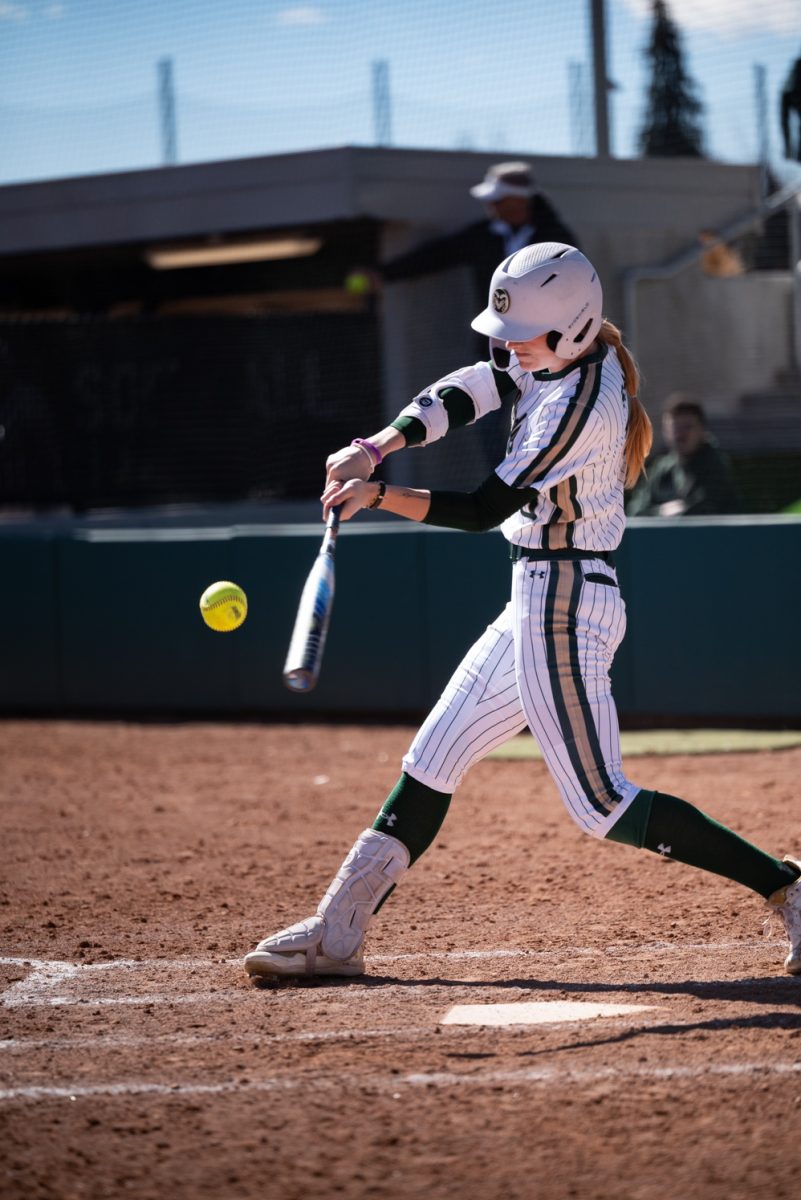 Senior Ashley York (18) hits the ball during CSU's first game of the day against Iowa State.