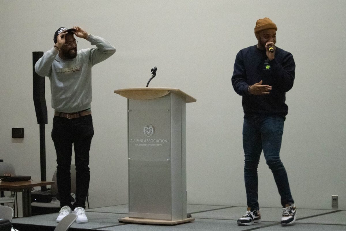 RO$$AY and Wayne Watts perform during the Black History Month Closing Open Mic Night on February 29, 2024.