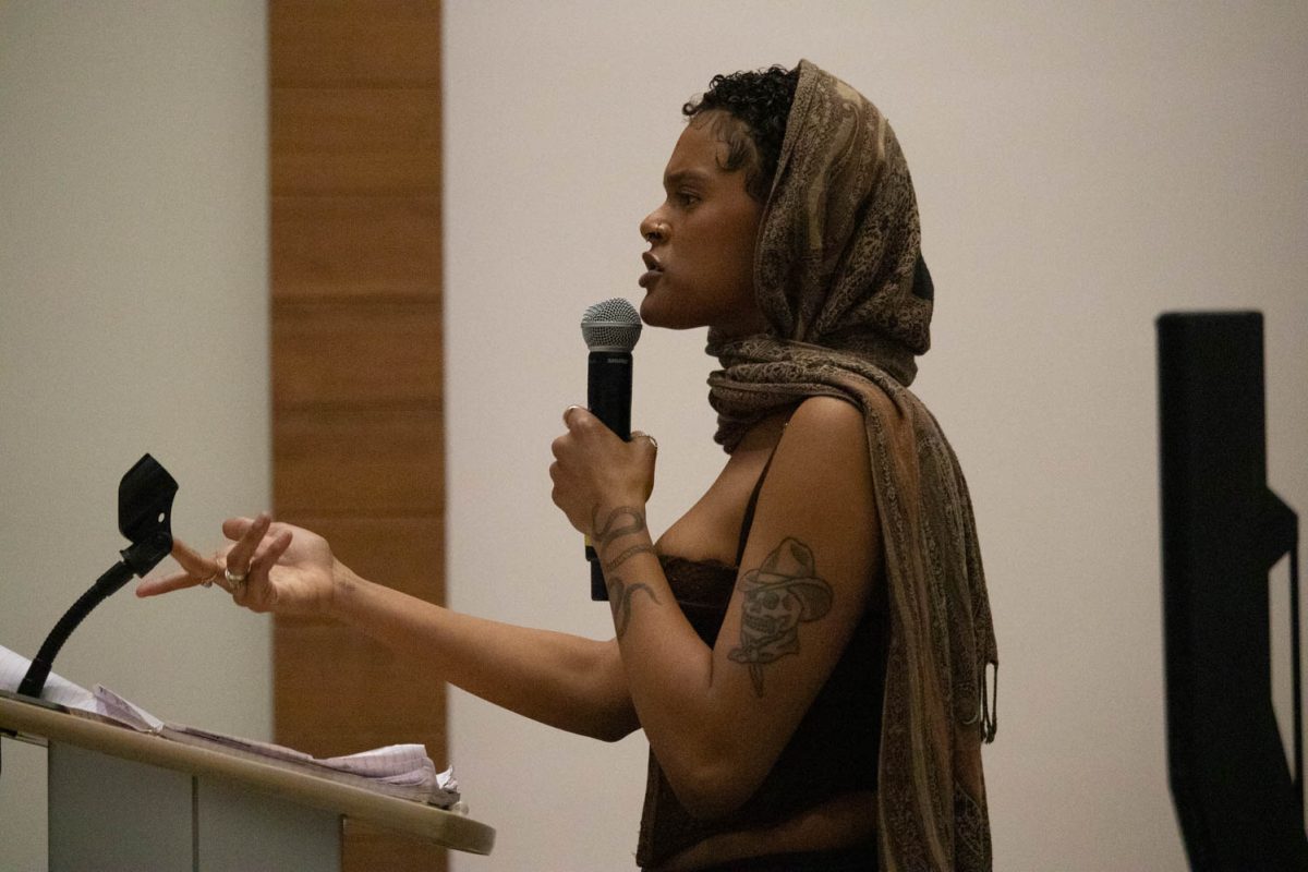 Breonna Abuya performs her poem during the Black History Month Closing Open Night on February 29, 2024.