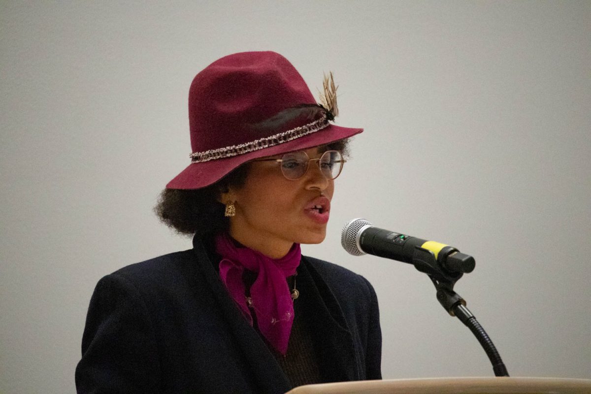 Zy Roberts reads "a social injustice poem" during the Black History Month Closing Open Mic Night on February 29, 2024.