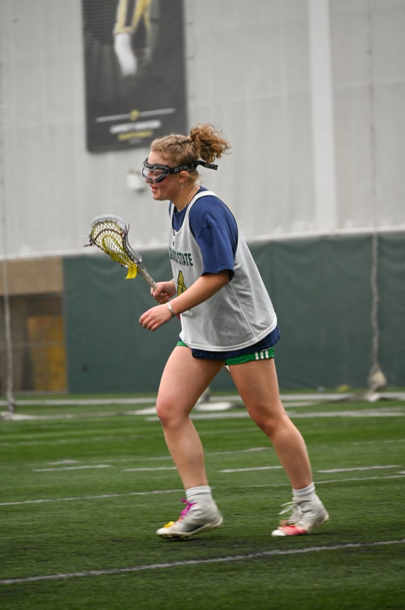 Carson Bainbridge runs to find an open spot during a scrimmage at the CSU women's lacrosse practice on March 6, 2024.