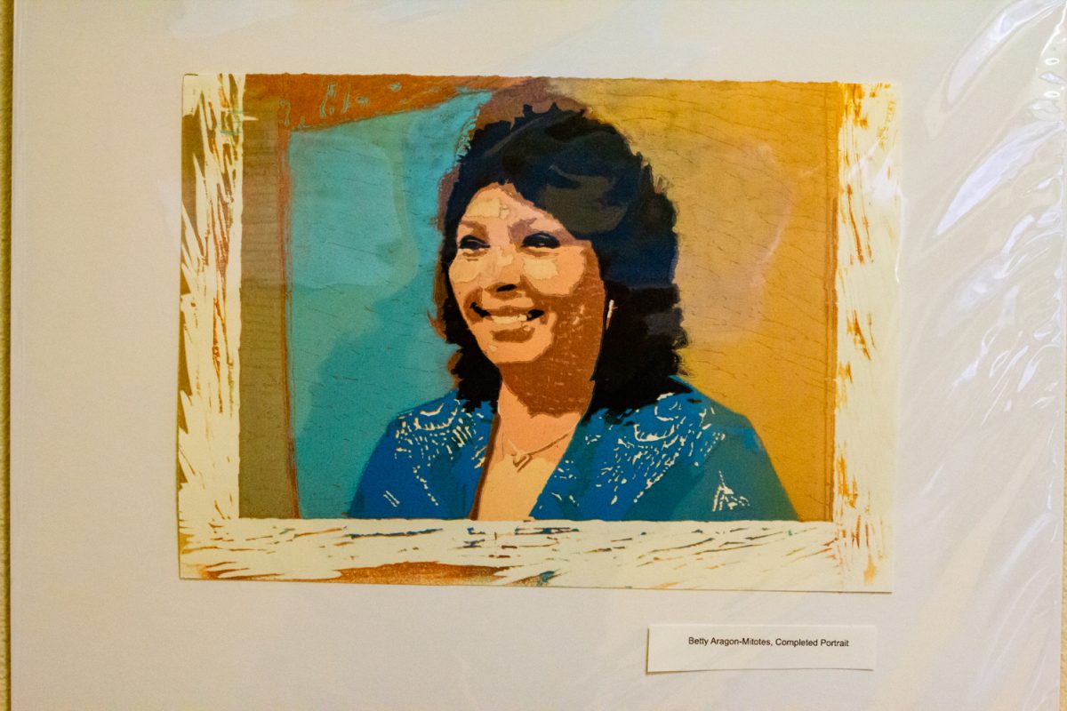 A framed portrait hangs on the wall.