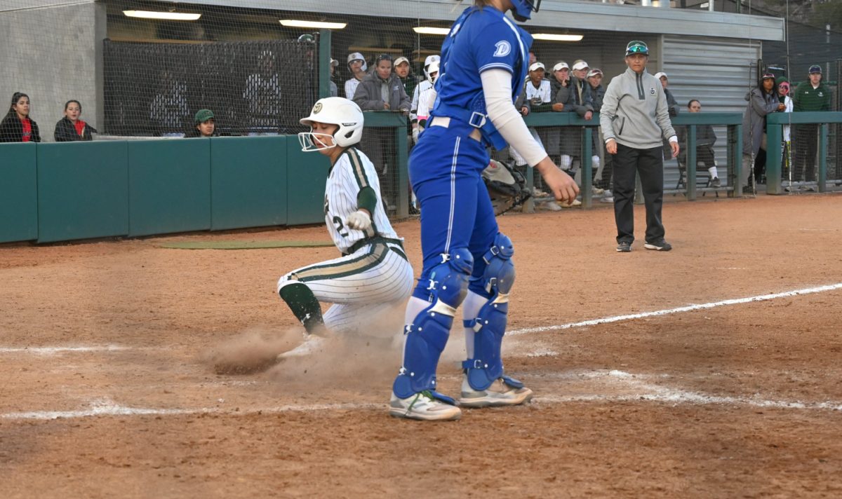 Maya Matsubara slides into home during the CSU vs. Drake softball game on March 9, 2024. (CSU won 10-0)