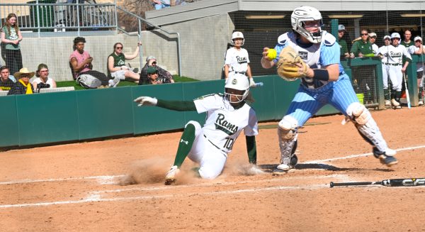 Jailey Wilson slides into home plate during the CSU vs. Maine softball game on March 10, 2024. (CSU won 17-1)
