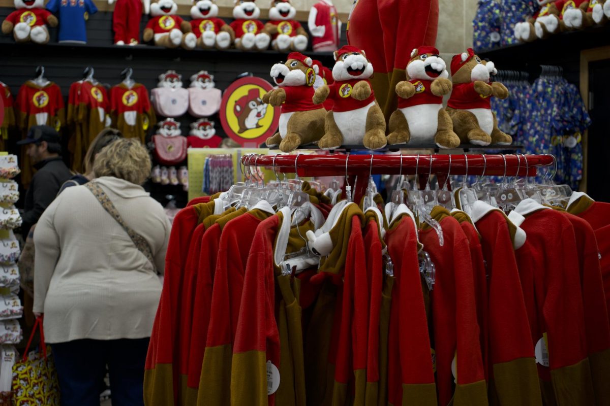 Buc-ee the Beaver stuffed animals displayed atop a rack of beaver onesies in the new Buc-ees location in Johnstown, Colorado, March 18. The travel center hits 74,000 square feet in area and boasts 116 fuel pumps.
