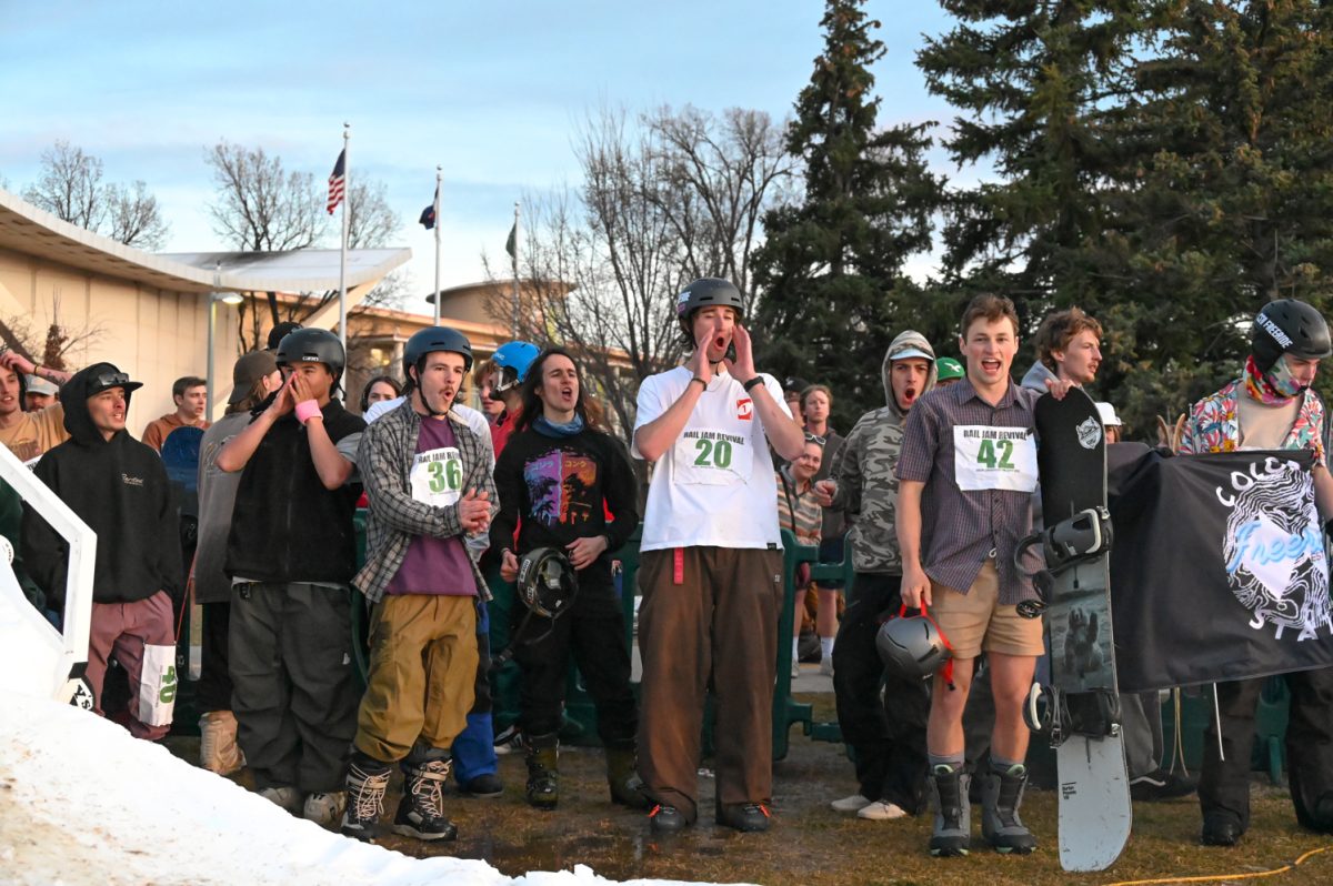 Colorado State University RailJam Revival competitors cheer on the skiers and boarders on the boxes and rails during the the competition March 21.